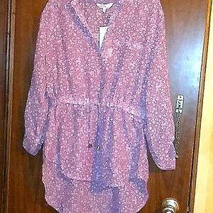 A beautiful summer mid sleeve flower printed shirt in a plumrose color